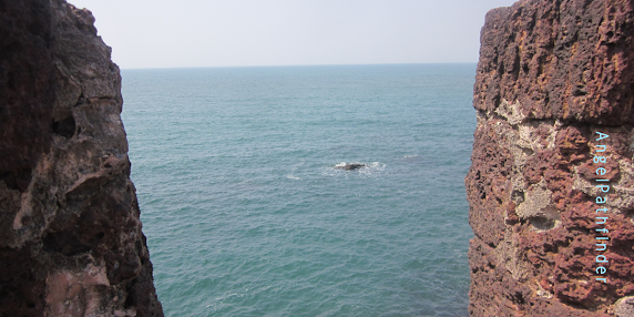 a glimpse of the sea from Jaigad fort- Mumbai Goa coastal adventure