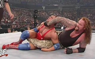 WWE / WWF Survivor Series 2000 - The Undertaker and his terrible snake skin pants challenged Kurt Angle for the WWF title