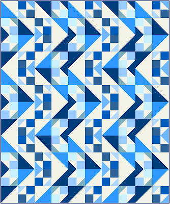 blue scrappy quilt Triangle Pursuit Sew Joy Creations
