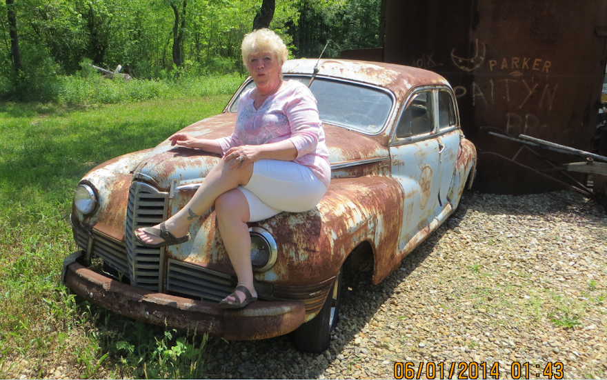 Sisaroo Archer on a Weird old Packard.