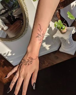 12 Gorgeous Dainty Leaf Line Tattoos Wrapping Around The Wrist