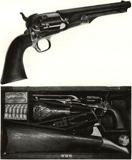 Production specimen New Model Army was cut for stock, fluted cylinder with fourth screw in frame for stock recoil. Serial No. 893 is typical of pistols made up to about 6500, though barrels 8" long predominated after first 1000. Barrel markings varied, Hartford stamp being abandoned early. Cased set shows same gun with stock, regular Army-size flask and “bowlegged” iron mould usually stamped 44H on side. Cartridge packet was invention of Roots but Colt invented opening string like red tape on cigarette package used today.