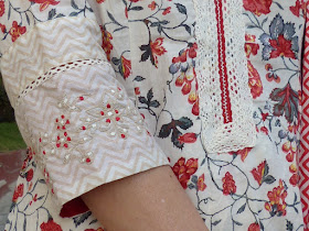 Crochet and embroidery decorative details on the dress 