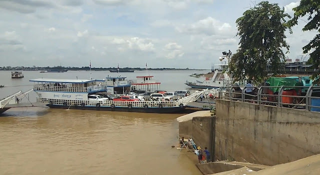 Ferry Bring Peoples From Side To Side On Mekong River Of Cambodia