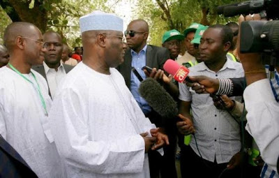 Shehu Shagari and Atiku Abubakar at their polling unit vote