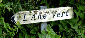L'Ane Vert signpost. Indre. France. Photographed by Susan Walter. Tour the Loire Valley with a classic car and a private guide.