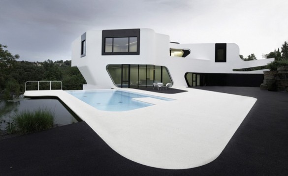 FACHADA DE CASA MINIMALISTA Casa Dupli por J. Mayer H. Arquitectos