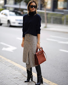 A Stylish Work-Ready Way to Wear a Plaid Midi Skirt — @ariviere in a Turtleneck Sweater, Hermes Bag, and Knee-High Boots