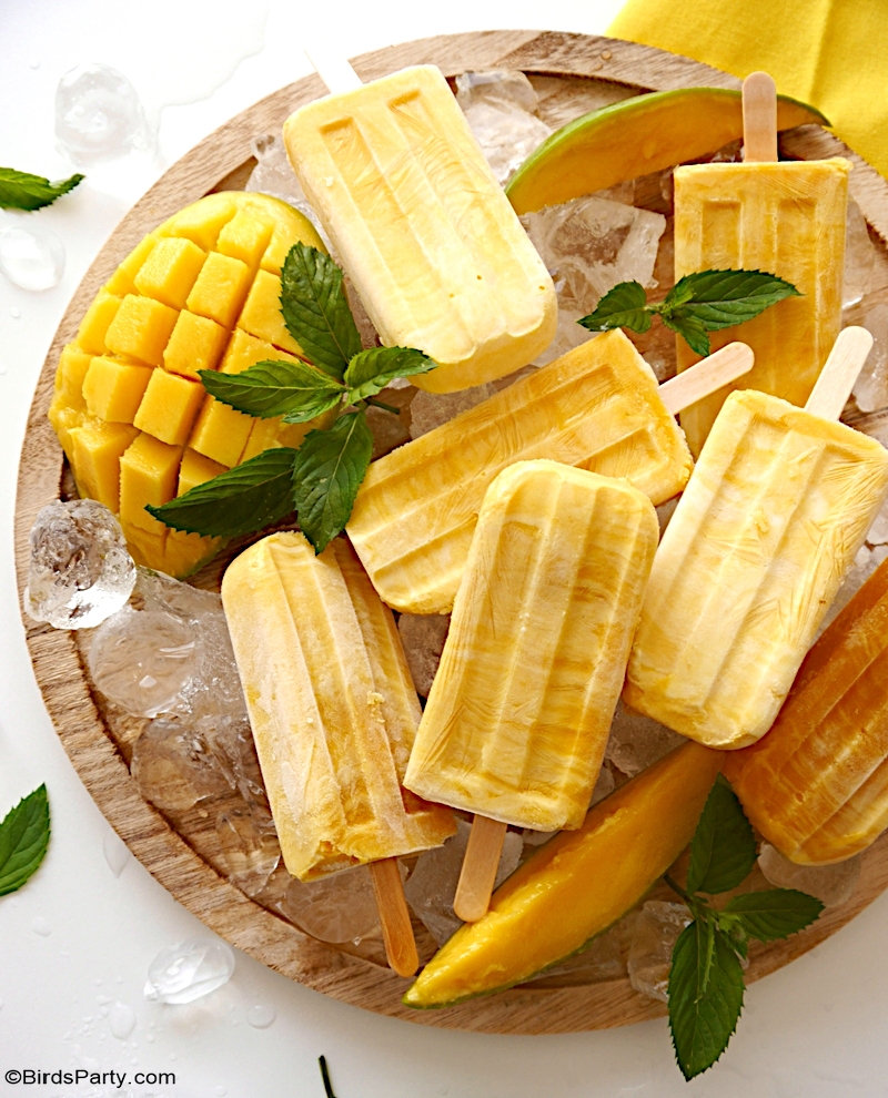 Mango and Yogurt Popsicles - easy to make, healthy, two-ingredient frozen lollipop recipe, perfect as a low-cost summer dessert or yummy snack treat! by BirdsParty.com @BirdsParty #popsciles #fruit #mango #mangorecipes #recipe #frozenpop #frozen #fruitpopsicles