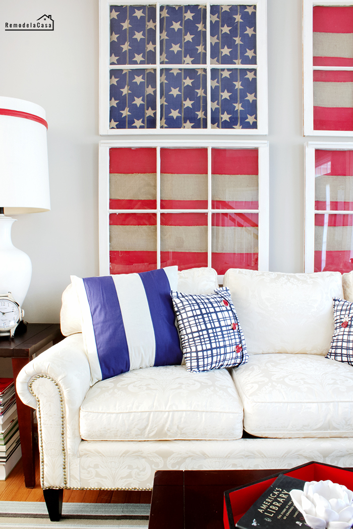 old windows decorated with American flag to celebrate fourth of July