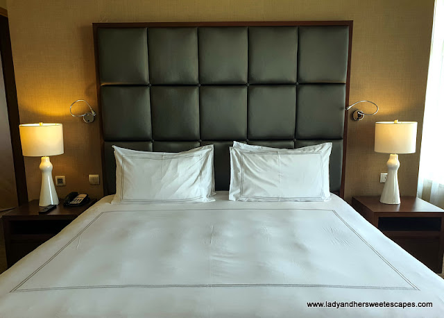 king size bed at Swissotel Al Ghurair Dubai