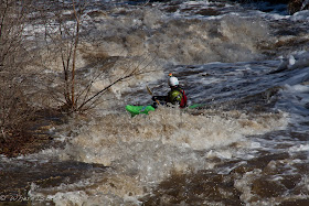 charging past one of the big holes on the Vermillion River, Chris Baer, Minnesota