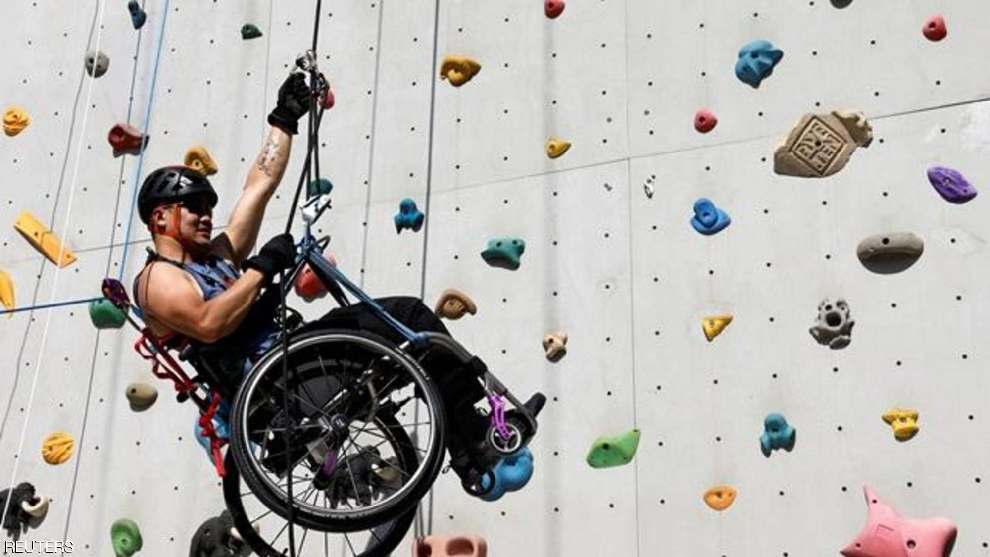 Lai Chi-wai ... climbs a wheelchair skyscraper