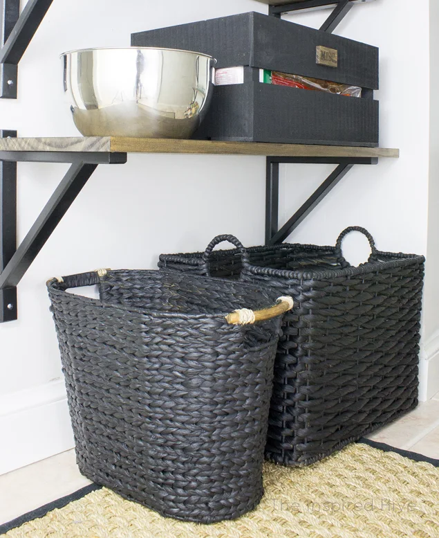 DIY industrial farmhouse pantry. Great idea to update baskets with spray paint and use them to store kitchen towels and bibs!