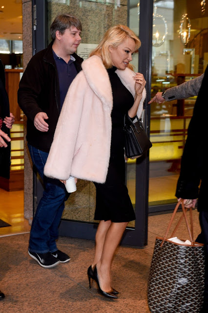 Pamela Anderson Photo While Leaving Her Hotel in Warsaw, Poland