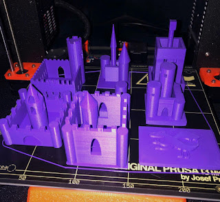 3D printed castles on a print bed