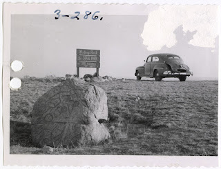 Lot 045 v3p47.3-286, View of the Syveruds’ automobile at the Writing Rock State Park in Divide County, North Dakota. Writing Rock No. 1 is in the foreground
