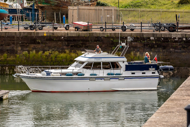 Photo of Phil turning Ravensdale around ready to leave the marina