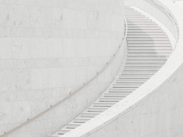 Curve in white marble stairs