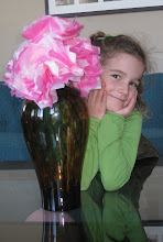 Charlotte and her "tissue flowers" made with Grammy