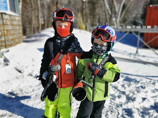 Kids with Sklon ski carry straps