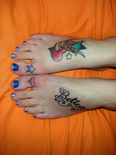 heart tattoos for girls on foot. tattoos on foot for girls.