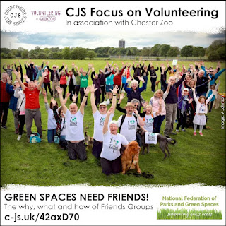 a group of smiling people and dogs standing and kneeling with arms in the air in a greenspace. Text reads: Green spades need friends! - The why, what and how of Friends Groups