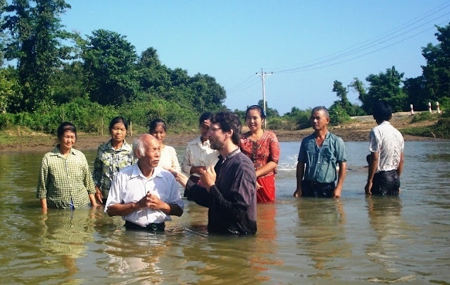 Pastor John Mark getting baptized by Tony Suckla