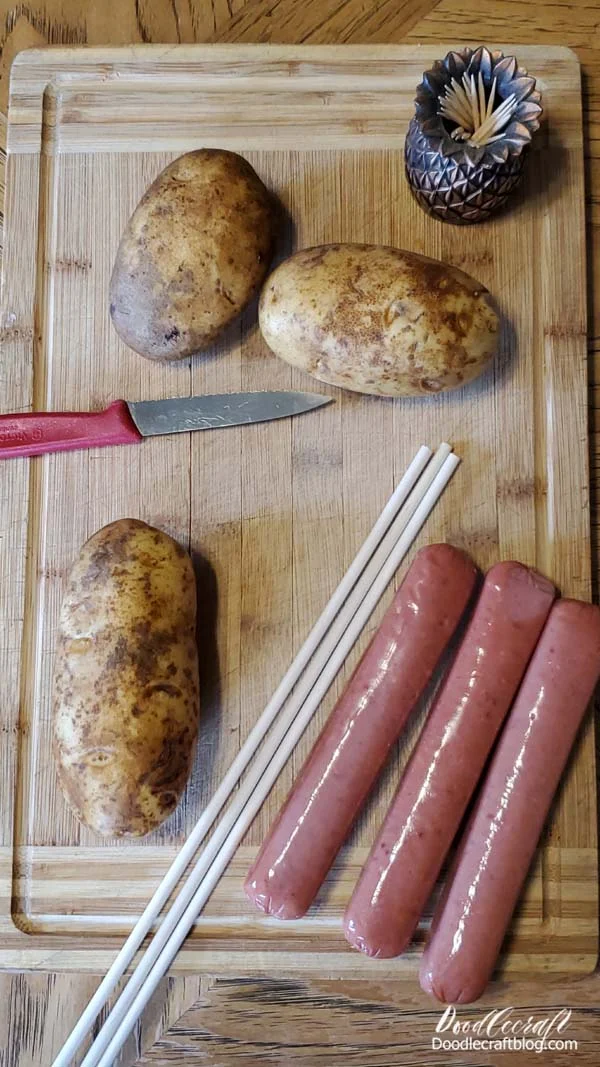 Step 1: Sticks  Start by sticking a dowel into a smoked sausage.