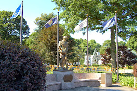 flags flying in the breeze over the World War I memorial