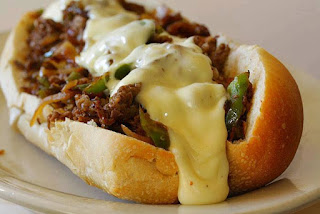 SLOW COOKER PHILLY CHEESE STEAK SANDWICHES