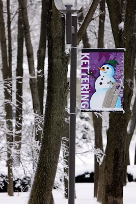 City Snowman Sign