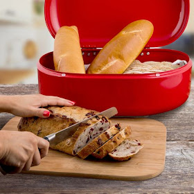 red bread bin with hinged lid open