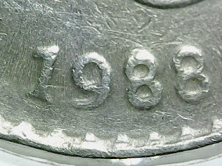 Malaysia 20 sen coin 1988 with die gouge error and struck through grease error.