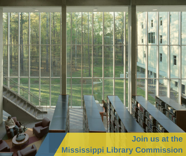 The interior of a library with two story tall windows that look out onto a wide lawn area backed by many trees. Someone is seated in a reading area reading a book. Text reads Join us at the Mississippi Library Commission