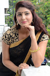 Sagarika glamorous photos in saree-thumbnail-37