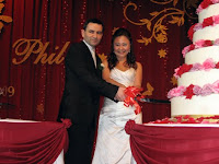 Phil and Sasha during the cake cutting ceremony