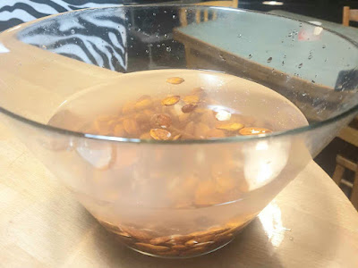 Almonds in bowl with fresh water.