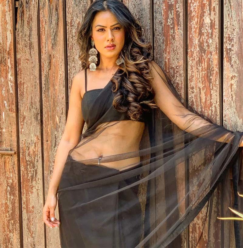 Nia Sharma black saree hot tv actress
