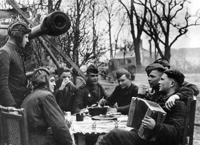 Soviet soldiers are celebrating a Victory Day