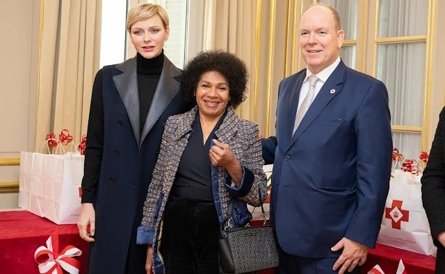 Princess Charlene wore a leather collar shearling navy wool sleeveless long vest gilet. Camille Gottlieb