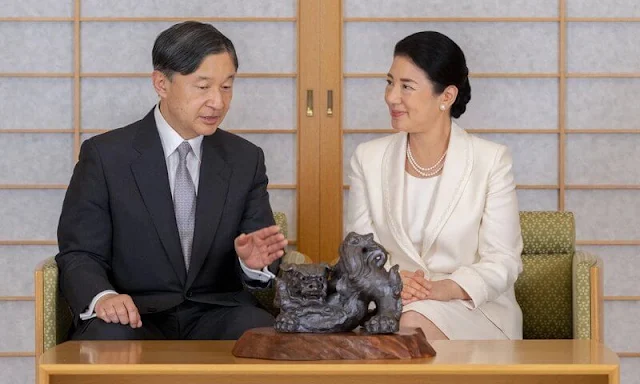 Emperor Naruhito and Empress Masako. Empress Masako wore an ivory blazer, skirt suit. pearls necklace and earrings