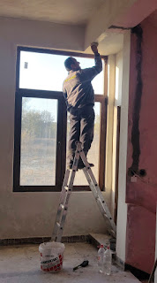 Bekir on an unsafe ladder as usual