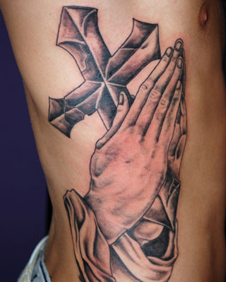 praying hands tattoo designs is not very hard to decipher.