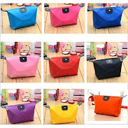 COLORFUL COSMETIC BAG  Tas organizer yg dapat digunakan untuk menyimpan kosmetik tersedia dalam beberapa warna cantik, terbuat dari bahan tebal dan tidak mudah robek. Ukuran tas kosmetik sebesar 22cm x 18cm, cukup besar untuk menyimpan botol body lotion, pasta gigi dll.  Dimensi 18cm x 22cm WARNA HARAP DITULIS DI CATATAN ORDER YA :) KL TIDAK ADA KAMI KIRIM CAMPUR SESUAI STOK YANG ADA TANPA KONFIRMASI.