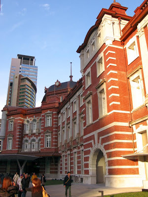 Tokyo Station against the Tokyo cityscape.