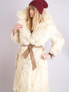 Vintage 1970's cream colored bohemian style mongolian fur coat with brown leather belt