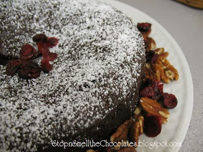 http://www.stopandsmellthechocolates.com/2012/04/chocolate-pecan-cranberry-cake.html