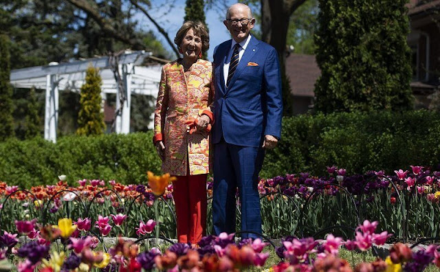 Dutch Princess Margriet wore pink and orange satin floral coat by Etro. Professor Pieter van Vollenhoven