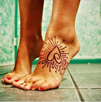 heart tattoos on feet 